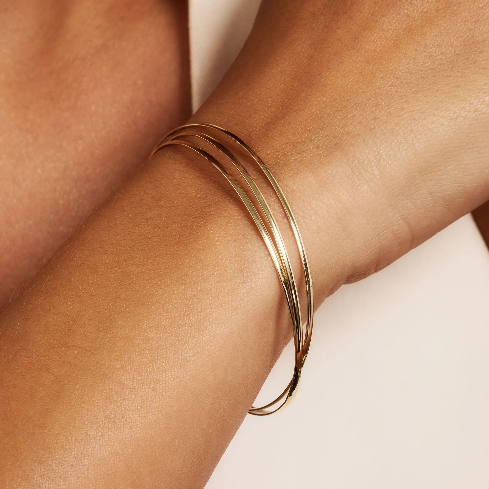 Rivoli Méline 14 karat gold bangles with 3 bracelets